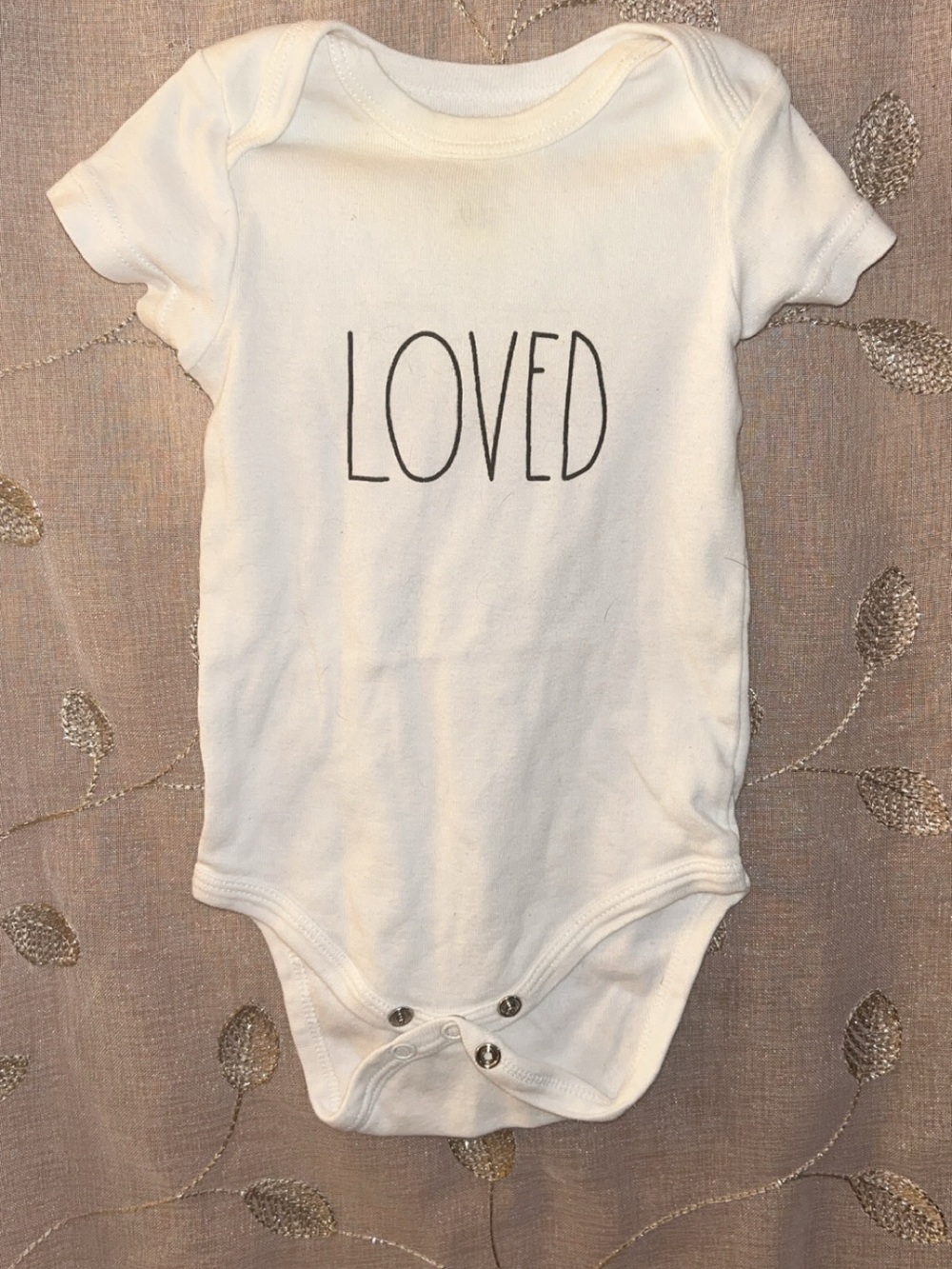 Rae Dunn Baby White Onesie with Black Text